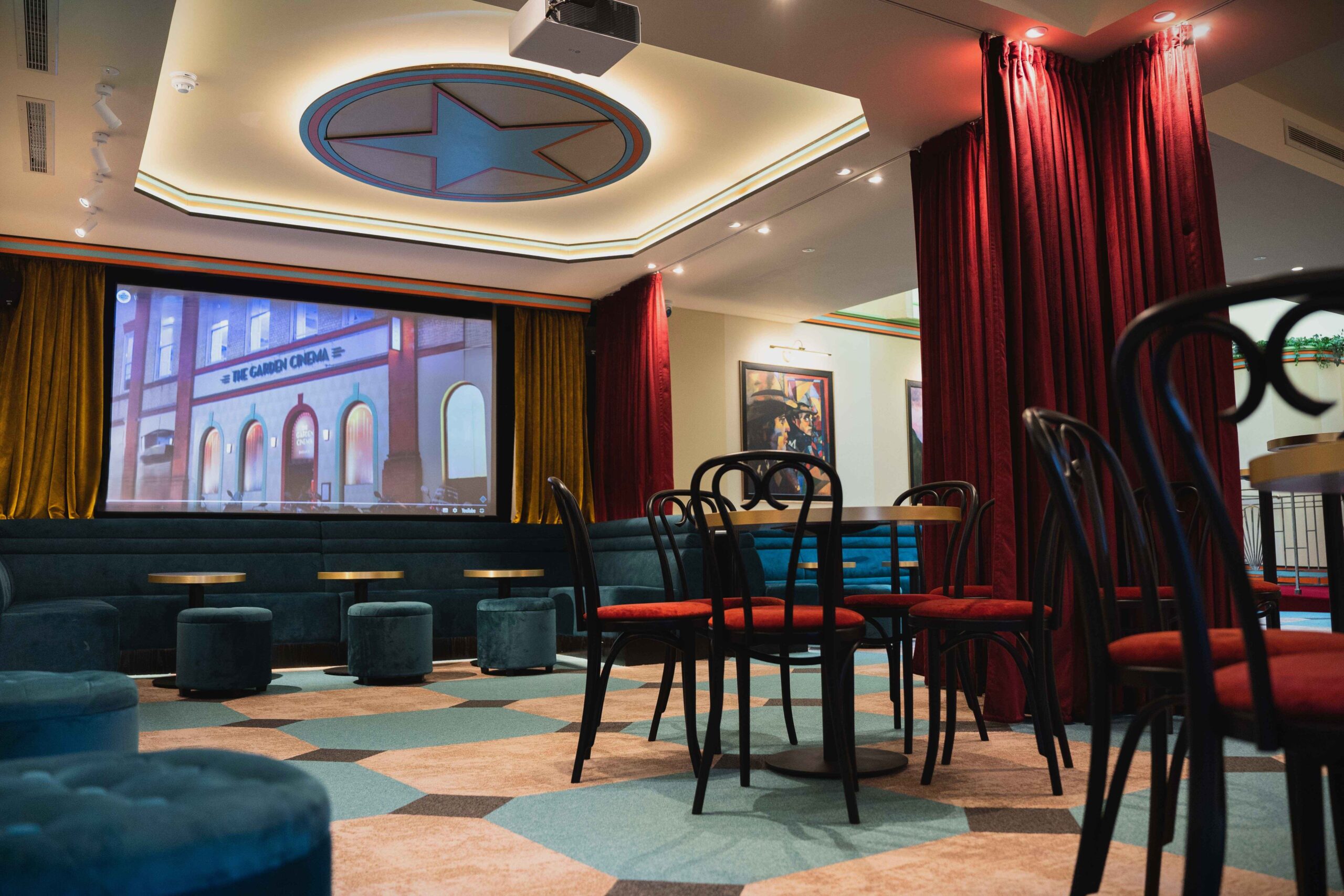 View of the projector screen in The Atrium Bar.